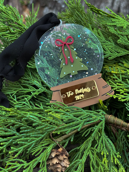 family snow globe ornament